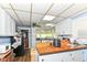 Spacious kitchen area with breakfast bar and white cabinetry at 6585 N Waverly Park Rd, Martinsville, IN 46151