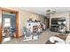 Cozy living room featuring a fireplace, ceiling fan, and plush seating at 6585 N Waverly Park Rd, Martinsville, IN 46151