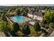 Breathtaking aerial view of community pool and surroundings showcasing lush landscaping and meticulous planning in sought-after location at 6734 W Stonegate Dr, Zionsville, IN 46077