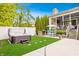 Backyard oasis featuring a hot tub, outdoor grill, and patio area for dining and entertaining at 6734 W Stonegate Dr, Zionsville, IN 46077