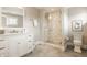 Bright bathroom with glass shower and neutral finishes at 6734 W Stonegate Dr, Zionsville, IN 46077