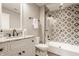 Modern bathroom with patterned tile in shower and sleek vanity at 6734 W Stonegate Dr, Zionsville, IN 46077