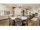 Open floor plan featuring kitchen and dining area with a round table at 6734 W Stonegate Dr, Zionsville, IN 46077
