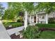 Charming Meeting House sign with lush landscaping, and classic architectural details at 6734 W Stonegate Dr, Zionsville, IN 46077