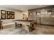 Game room with pool table, recessed art niches, and sliding barn door at 6734 W Stonegate Dr, Zionsville, IN 46077