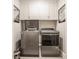 Laundry room featuring modern Whirlpool washer and dryer at 6734 W Stonegate Dr, Zionsville, IN 46077