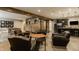 Finished basement with bar area, pool table and stylish seating at 6734 W Stonegate Dr, Zionsville, IN 46077