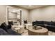Bright living room with comfortable seating, decorative pillows, and neutral tones at 6734 W Stonegate Dr, Zionsville, IN 46077