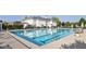 Stunning community pool with lap lanes and ample seating offers residents a refreshing escape and a place to relax at 6734 W Stonegate Dr, Zionsville, IN 46077