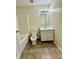 This bathroom features a sink and vanity, a toilet, and a shower/bathtub with tile surround at 6903 Governors Pointe Blvd, Indianapolis, IN 46217