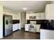 Updated kitchen with stainless steel appliances and ample counter space at 6903 Governors Pointe Blvd, Indianapolis, IN 46217