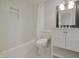 Bathroom with classic subway tiles, mosaic floors, and a vanity at 701 Lincoln St, Indianapolis, IN 46203