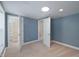 Bedroom with ample space, plush carpeting, and neutral color palette at 701 Lincoln St, Indianapolis, IN 46203
