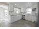 Modern kitchen with stainless steel appliances, ample storage, and stylish backsplash at 701 Lincoln St, Indianapolis, IN 46203
