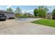 This home has a backyard with a pool and shed and a concrete patio perfect for lounging at 7157 Chemistry Ct, Indianapolis, IN 46239