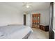 Bedroom featuring a ceiling fan, window, neutral walls and bed at 7157 Chemistry Ct, Indianapolis, IN 46239