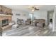 Cozy living room with brick fireplace and comfortable seating at 7157 Chemistry Ct, Indianapolis, IN 46239
