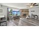 Bright living room with fireplace and large windows at 7157 Chemistry Ct, Indianapolis, IN 46239