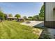 Backyard with a large lawn, storage shed, and ample space for outdoor activities at 7285 E County Road 900 N, Brownsburg, IN 46112