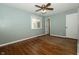 Well-lit bedroom featuring hardwood floors, closet space and a neutral color scheme at 7285 E County Road 900 N, Brownsburg, IN 46112