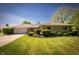Inviting single story home with landscaped front yard and basketball hoop by the attached garage at 7285 E County Road 900 N, Brownsburg, IN 46112