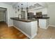 Stylish kitchen with stainless steel appliances, modern sink fixture and decorative ceiling tiles at 7285 E County Road 900 N, Brownsburg, IN 46112