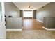 Open living room featuring hardwood floors, a large window, and neutral paint at 7285 E County Road 900 N, Brownsburg, IN 46112