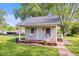 Back exterior porch with rocking chairs at 744 Gilbert Ave, Indianapolis, IN 46227