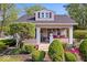 Charming home with landscaped front yard and inviting porch at 744 Gilbert Ave, Indianapolis, IN 46227