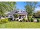 Charming home featuring well manicured landscaping at 744 Gilbert Ave, Indianapolis, IN 46227