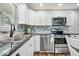 Modern kitchen with sleek countertops, stainless steel appliances, and ample cabinet space at 744 Gilbert Ave, Indianapolis, IN 46227