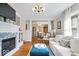 Inviting living room featuring a fireplace and hardwood floors at 744 Gilbert Ave, Indianapolis, IN 46227