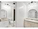 Bright bathroom with a double sink, granite countertops, and new fixtures at 7642 Lancer Ln, Lawrence, IN 46226
