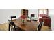 View of a dining room that leads to a living room with a fireplace at 7642 Lancer Ln, Lawrence, IN 46226