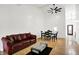 Spacious living room with high ceiling, and hardwood floors at 7642 Lancer Ln, Lawrence, IN 46226