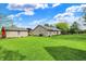 Spacious backyard with well-maintained lawn and appealing exterior structures at 7655 N Kitchen Rd, Mooresville, IN 46158
