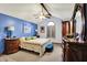 A luxurious bedroom with vaulted ceilings and stylish décor and ample dresser space at 7655 N Kitchen Rd, Mooresville, IN 46158