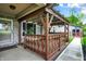 Charming porch with decorative railings and an overhead pergola, perfect for enjoying the outdoors at 7655 N Kitchen Rd, Mooresville, IN 46158