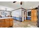 Spacious kitchen with dining room access, wood cabinets, and an adjacent pantry at 7655 N Kitchen Rd, Mooresville, IN 46158