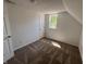 Bedroom with plush carpet, a window letting in natural light, and a closet at 810 S 18 Th St, Elwood, IN 46036