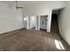 Inviting living space featuring carpeted floors, and entry into the stairs at 810 S 18 Th St, Elwood, IN 46036
