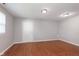 Finished basement with recessed lighting and wood flooring at 8144 E 50Th St, Indianapolis, IN 46226