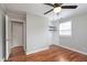 This bedroom features a closet, wood floors, and neutral paint at 8144 E 50Th St, Indianapolis, IN 46226