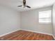 Bedroom with neutral paint, laminate flooring and a ceiling fan at 8144 E 50Th St, Indianapolis, IN 46226