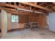 Unfinished garage space with work bench and peg board at 8144 E 50Th St, Indianapolis, IN 46226