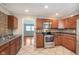 Updated kitchen featuring stainless steel appliances, tile backsplash, and plenty of counter space at 8144 E 50Th St, Indianapolis, IN 46226