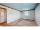 Cozy bedroom with neutral carpeting, closet, and a bright window at 8630 E Mcgregor Rd, Indianapolis, IN 46259