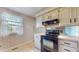 Efficient kitchen with appliances and abundant cabinet space at 8630 E Mcgregor Rd, Indianapolis, IN 46259