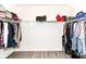 Large walk-in closet with ample shelving and hanging space, providing excellent storage solutions at 89 Kinnick Dr, Greenwood, IN 46143