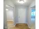 Bright foyer with hardwood flooring and fresh paint at 9125 Bagley Way, Indianapolis, IN 46231